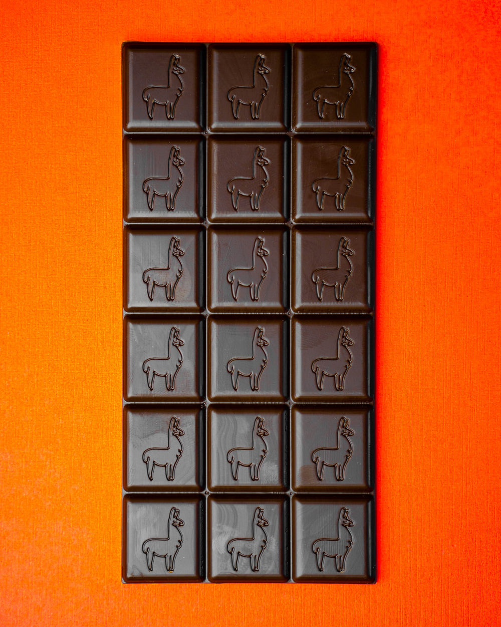 Alderwood Smoked Sea Salt & Roasted Almonds 70% dark chocolate bar with the llama on every square, from above