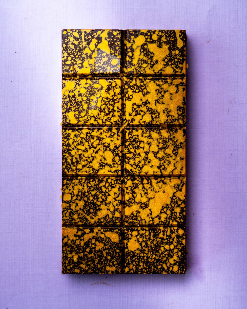 Gianduja Roche STUFFT bar, gold-speckled dark chocolate, from above
