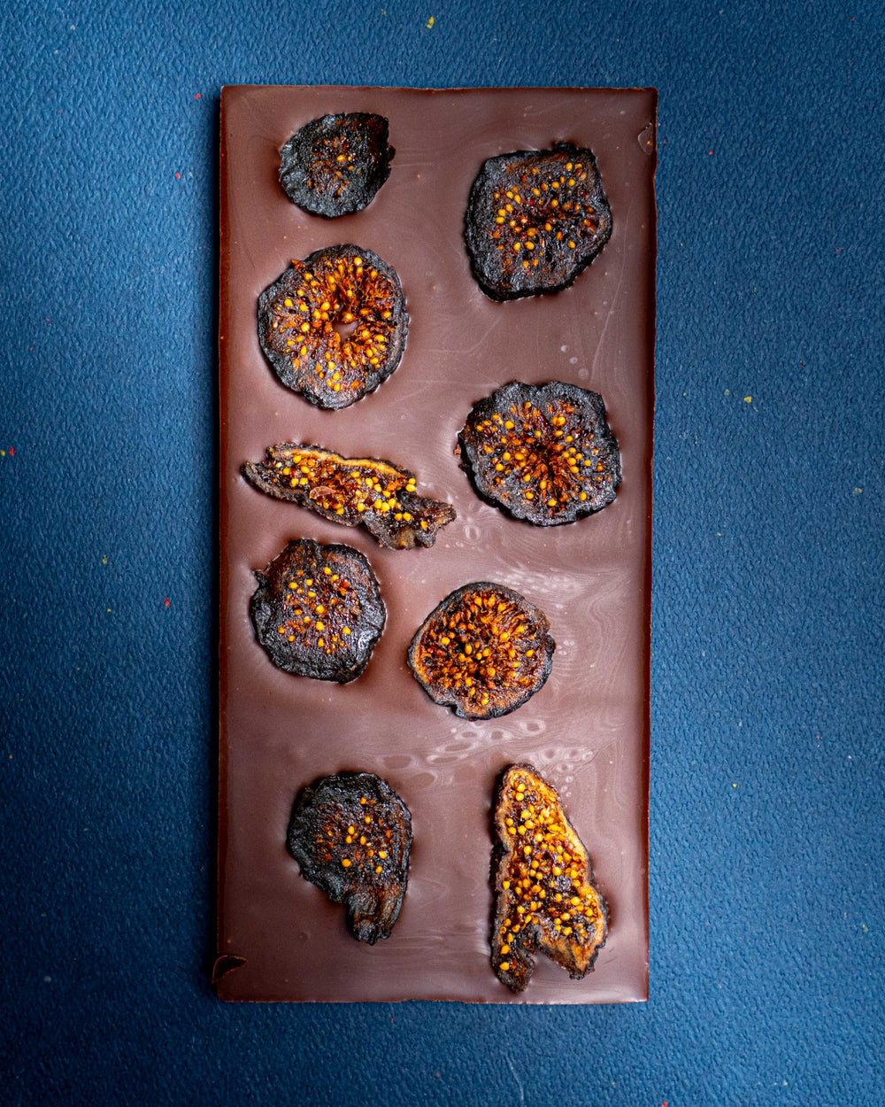 Vanilla Fig 90% dark chocolate bar topped with sliced dried black mission figs, from above