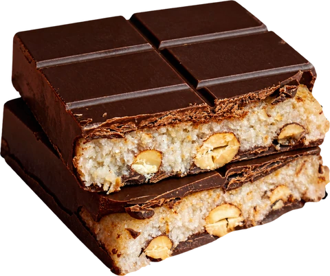 Coconut Almond Dream STUFFT bar, broken open to show the toasted coconut filling and whole roasted almonds