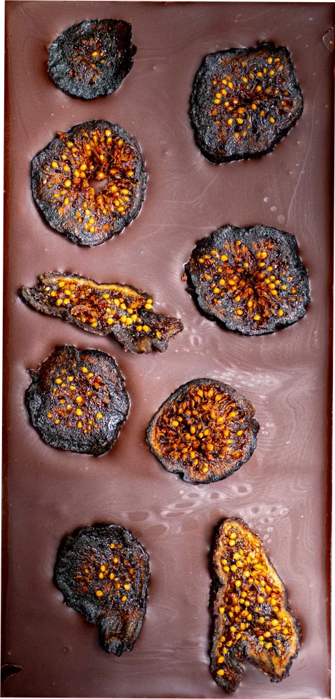 Vanilla Fig 90% dark chocolate bar topped with sliced dried black mission figs, shown at an angle
